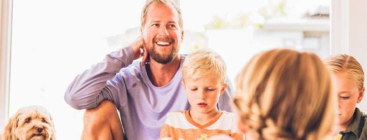 Dad laughing with son